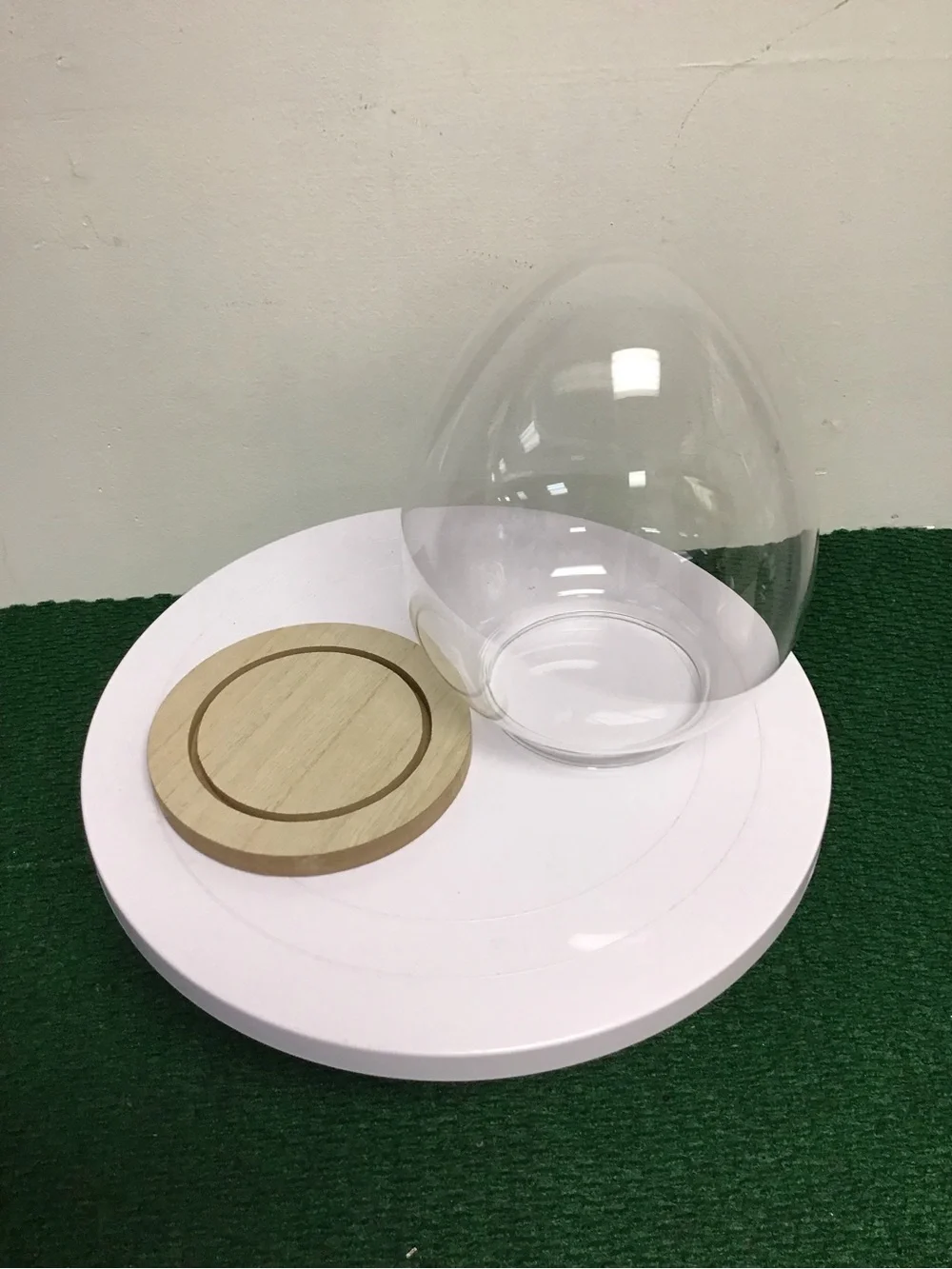 Target Clear Glass Dome with Natural Wood Base on White Pedestal